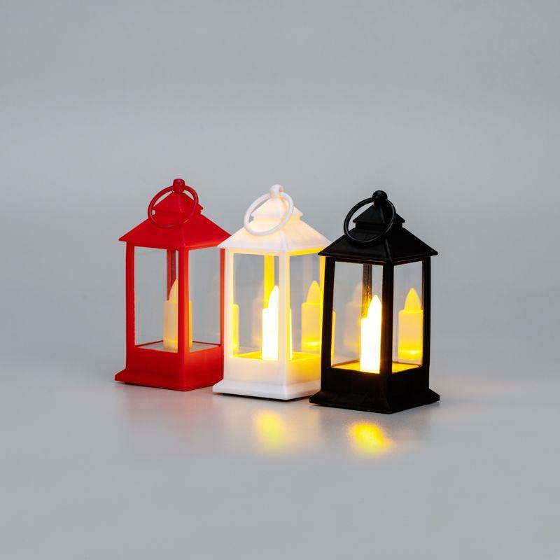 Фонарь декоративный (фигура) 5.5х5.5х12.5см тепл. бел. со свечкой 3хLR1130 (в комплекте) корпус бел./красн./черн. Neon-Night 513-068